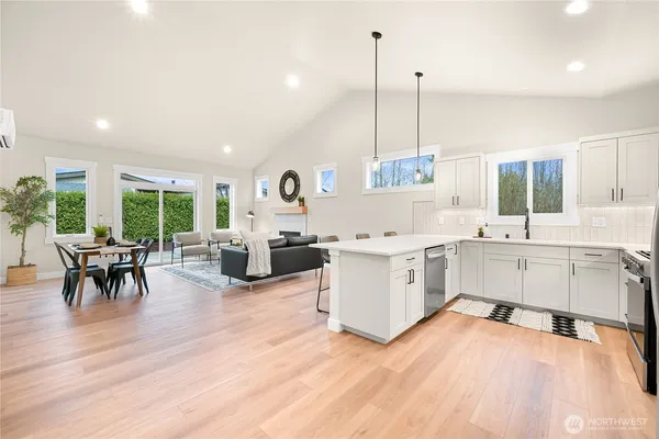 a kitchen with sink cabinets and window
