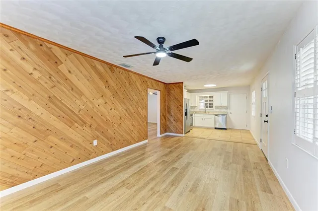 an aerial view of a house with a ocean view