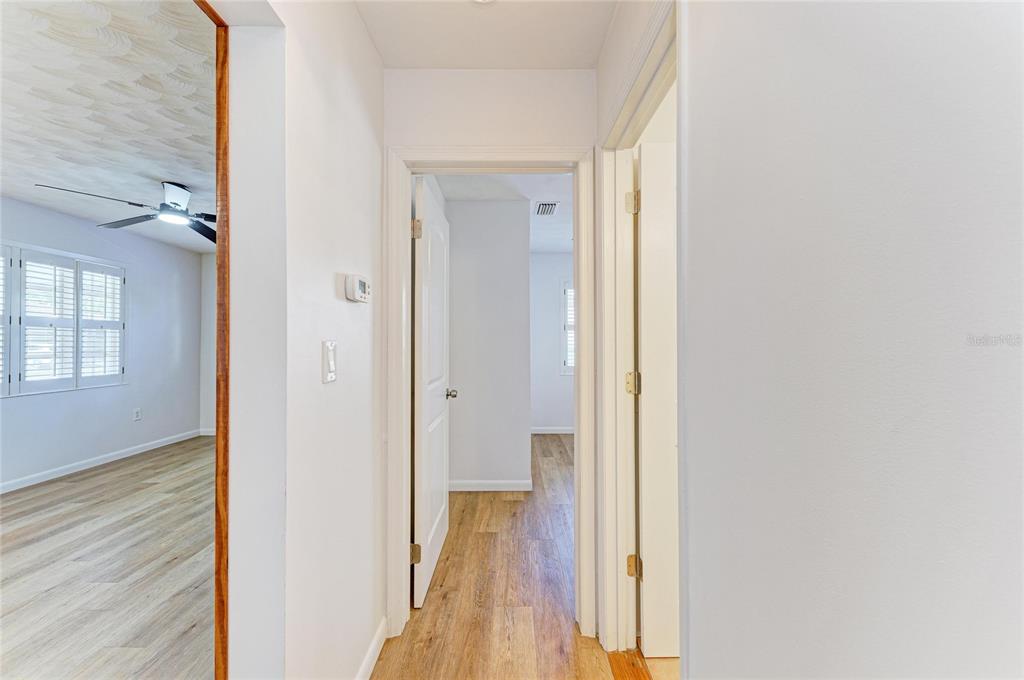 616 Palm Avenue Ellenton, FL 34222 - Photo 26 of 53 a view of a hallway with wooden floor