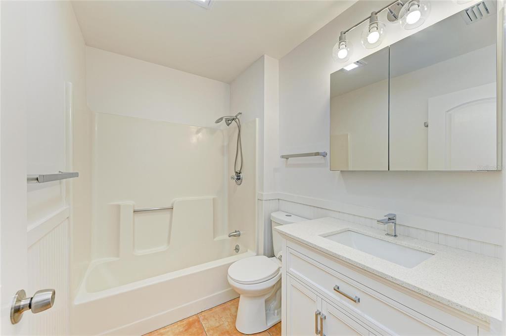 616 Palm Avenue Ellenton, FL 34222 - Photo 27 of 53 a bathroom with a sink a toilet and shower