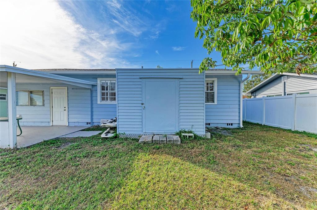 616 Palm Avenue Ellenton, FL 34222 - Photo 30 of 53 front view of a house with a yard