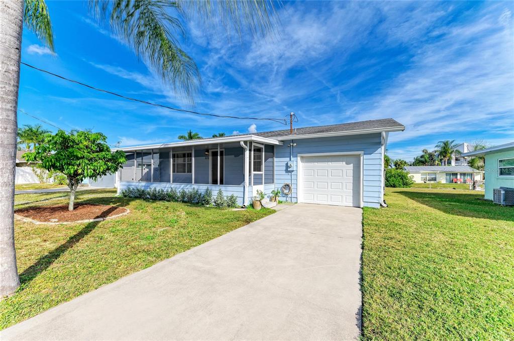 616 Palm Avenue Ellenton, FL 34222 - Photo 5 of 53 front view of a house with a yard