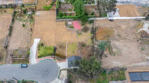 an aerial view of residential house with outdoor space