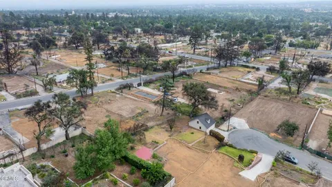 an aerial view of a city with lots of residential buildings