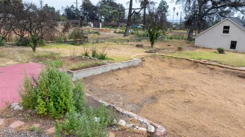 a view of backyard with green space