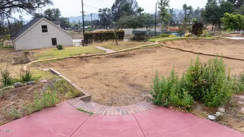 a view of backyard of house