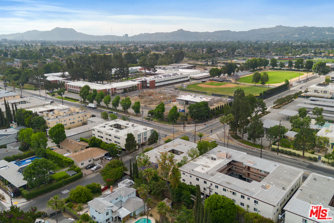 13101 Oxnard Street Van Nuys, CA 91401 - Photo 4 of 14 aerial view of a city with mountains