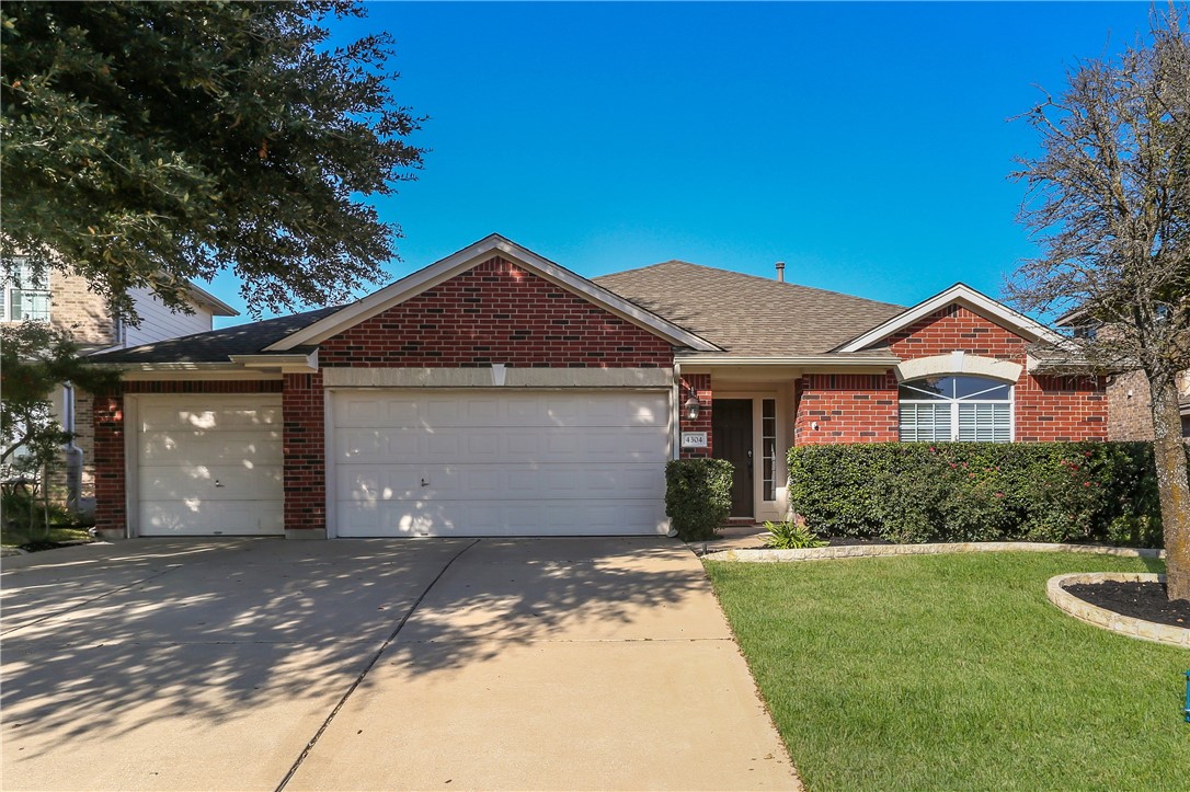 4304 Park Vista Trail Round Rock, TX 78665 - Photo 1 of 1 a front view of a house with yard and green space