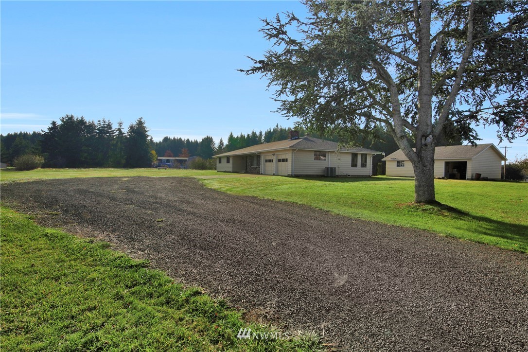 433 Curtis Hill Road Chehalis, WA 98532 - Photo 2 of 22 a view of a yard with large trees
