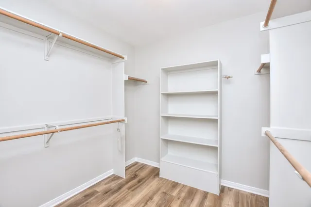 a bathroom with a bathtub and a sink