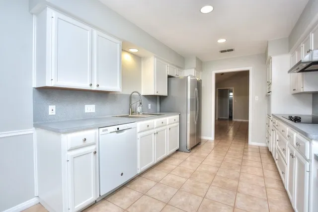 a view of a backyard with a garden