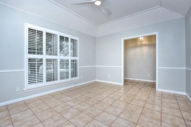 a view of empty room with windows