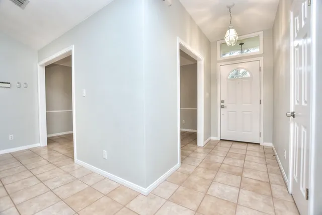 a view of an empty room with window