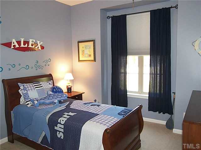 2765 Cashlin Drive Raleigh, NC 27616 - Photo 13 of 25 The secondary bedroom is in the front of the house, tucked away off a short private hall. It has a double closet and easy access to the hall bath.