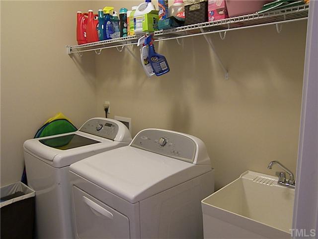 2765 Cashlin Drive Raleigh, NC 27616 - Photo 15 of 25 This laundry room is not a mudroom. It is off a short hallway leading to the garage.