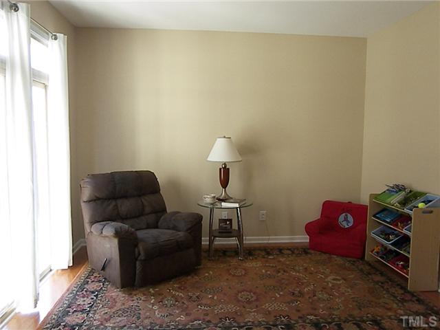 2765 Cashlin Drive Raleigh, NC 27616 - Photo 16 of 25 Perfect study/office/playroom. With an acceptable offer, the seller will even change this area into a 3rd BR, as outlined in the original builder specs. Notice the doorway to the courtyard.