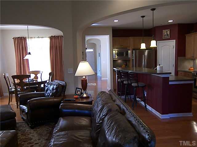 2765 Cashlin Drive Raleigh, NC 27616 - Photo 21 of 25 So comfortable, so functional, so current. A panoramic view. The light coming in by the breakfast nook is a sliding glass door exiting onto the courtyard.