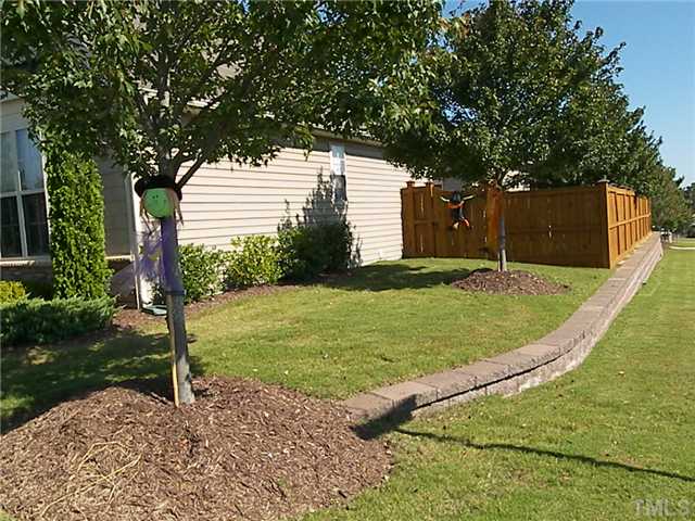 2765 Cashlin Drive Raleigh, NC 27616 - Photo 8 of 25 Your hoa fees include lawn care, pre-existing landscaping, and taking care of the fences. The hoa removed and is replacing a tree in the front yard that was damaged in a storm.