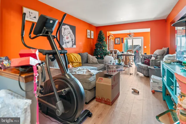 a outdoor living space with furniture potted plant and outdoor seating