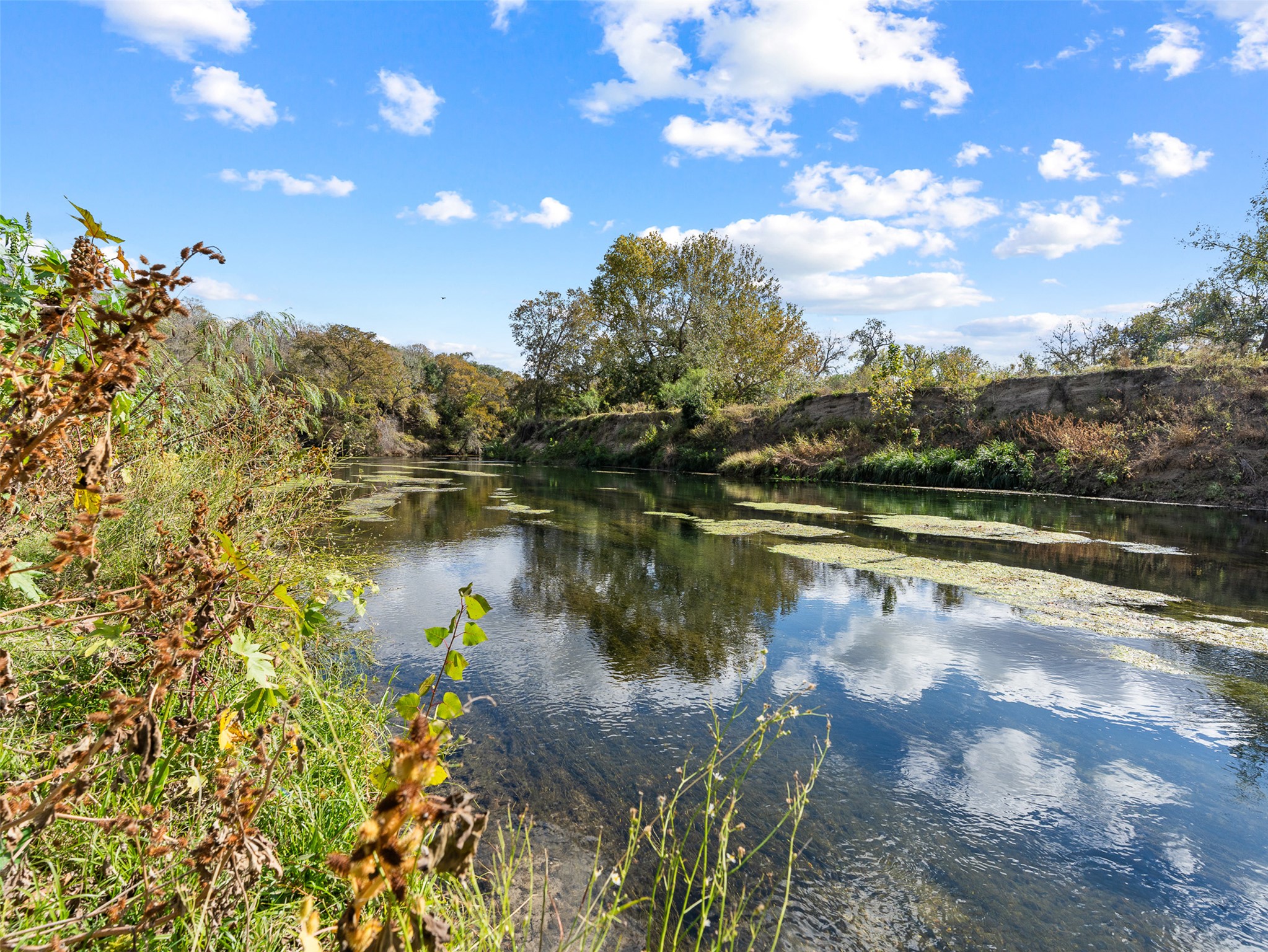 3 Highway 90 Harwood, TX 78632 - Photo 17 of 33 a view of a lake with houses in the back