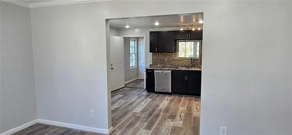 a view of kitchen and utility room