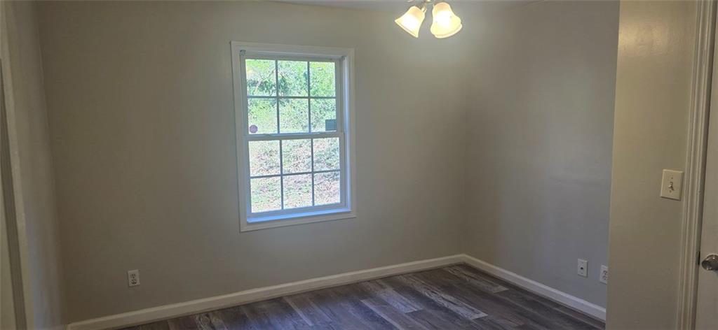 1280 Elizabeth Avenue Southwest Atlanta, GA 30310 - Photo 8 of 9 an empty room with a window