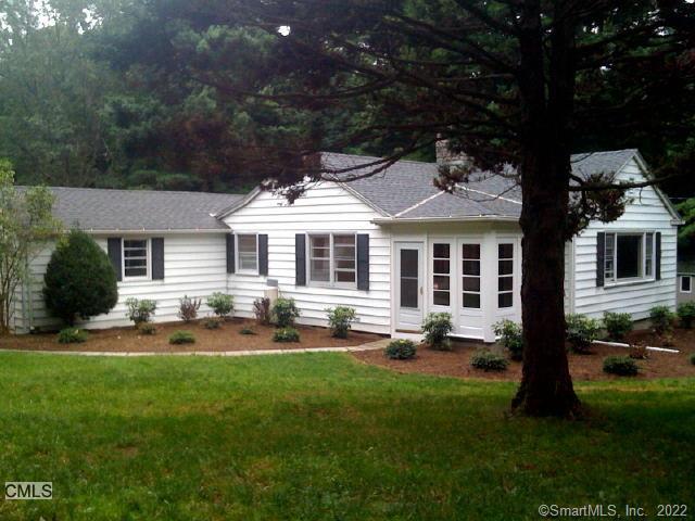 13 Codfish Hill Road Bethel, CT 06801 - Photo 1 of 1 a patio that has couches chairs and a big yard