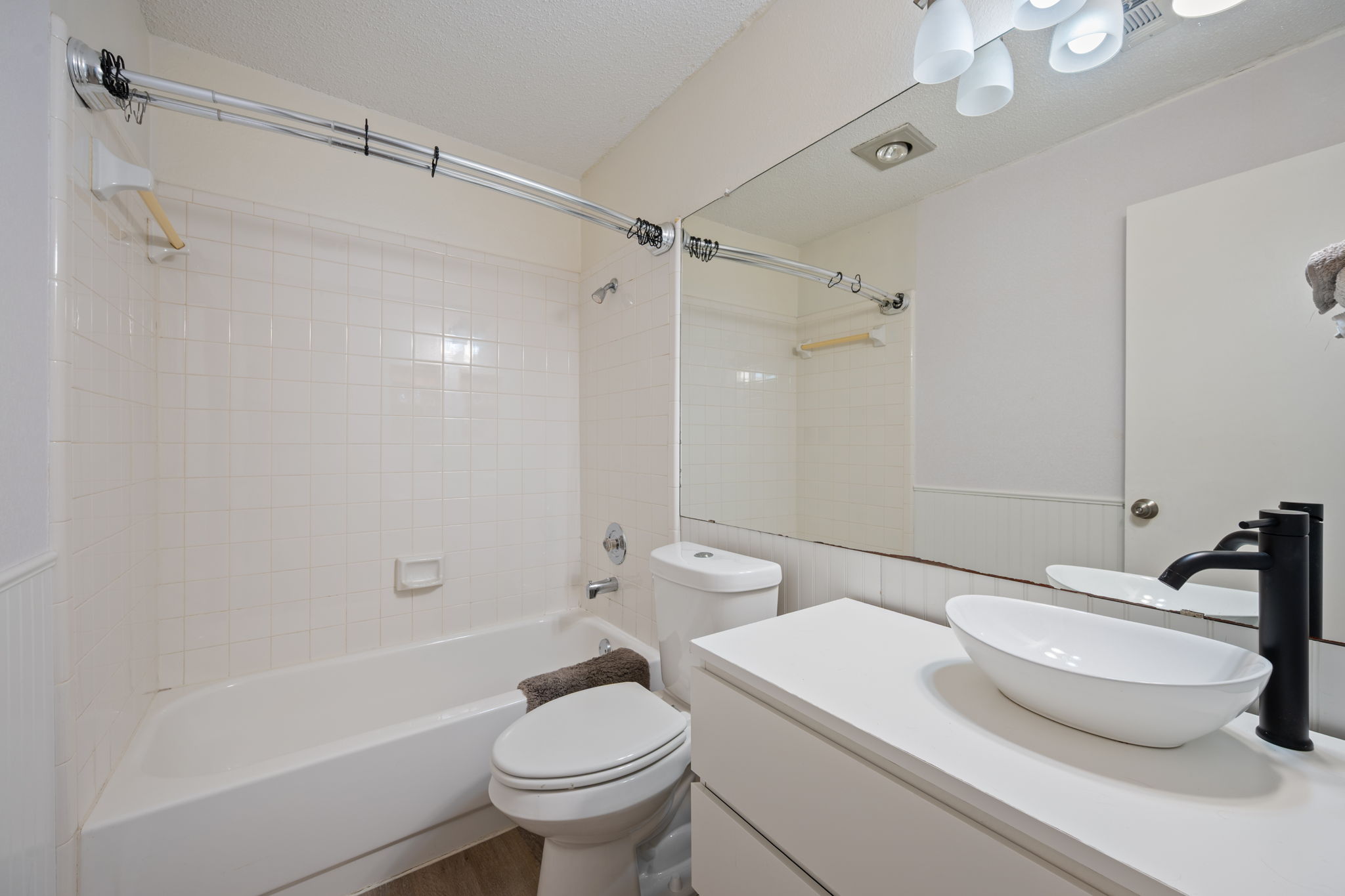 12501 Fallen Tower Lane Austin, TX 78753 - Photo 24 of 31 a bathroom with a sink toilet and shower