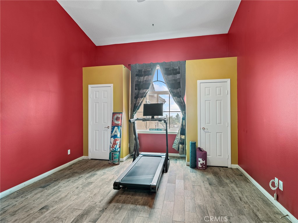 10160 Pineview Road Pinon Hills, CA 92372 - Photo 13 of 46 a living room with furniture and a wooden floor