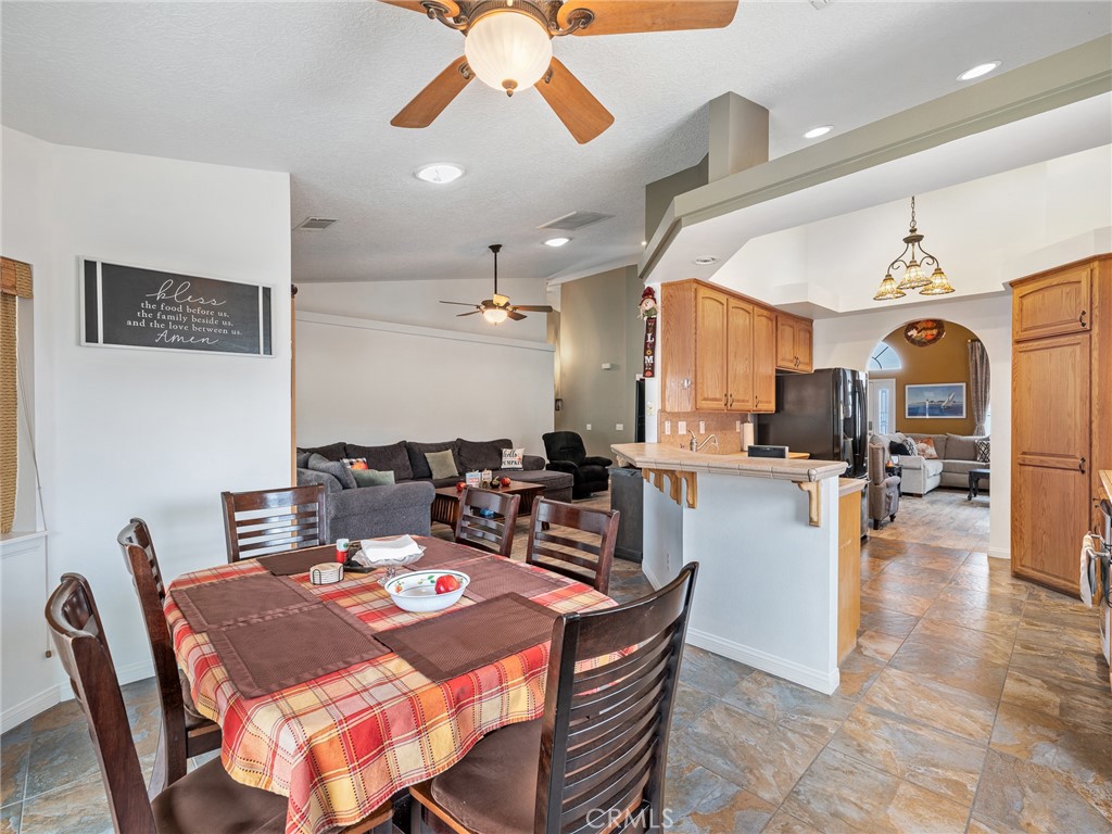 10160 Pineview Road Pinon Hills, CA 92372 - Photo 9 of 46 a view of a dining room with furniture