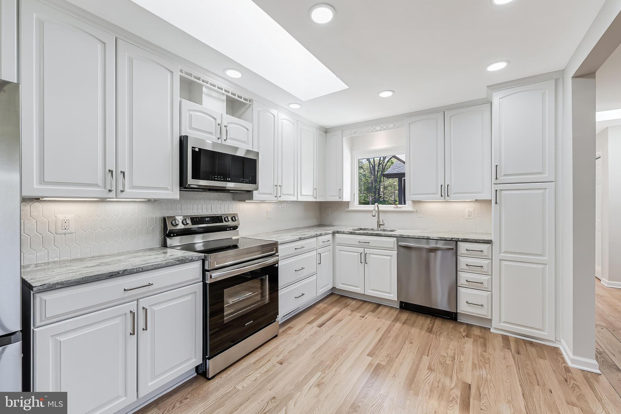 6891 Wilson Road Marshall, VA 20115 - Photo 62 of 118 Modern kitchen with sleek finishes.