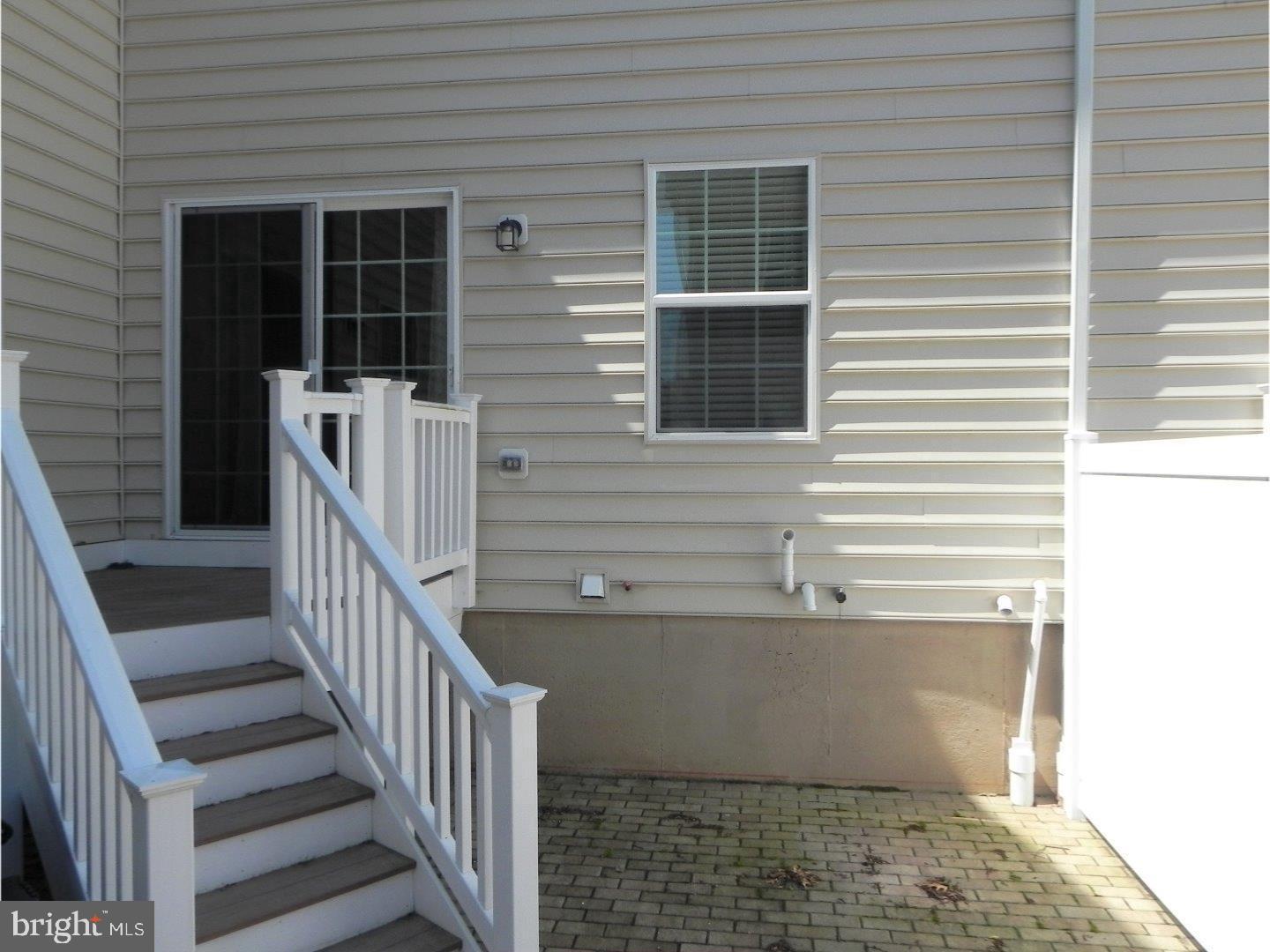 3880 Cephas Child Road, Unit 9 Doylestown, PA 18902 - Photo 17 of 18 a view of a house with stairs and a window