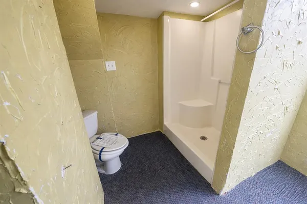 a bathroom with a sink and a toilet
