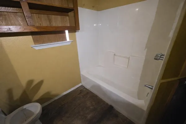 wooden floor and windows in an empty room