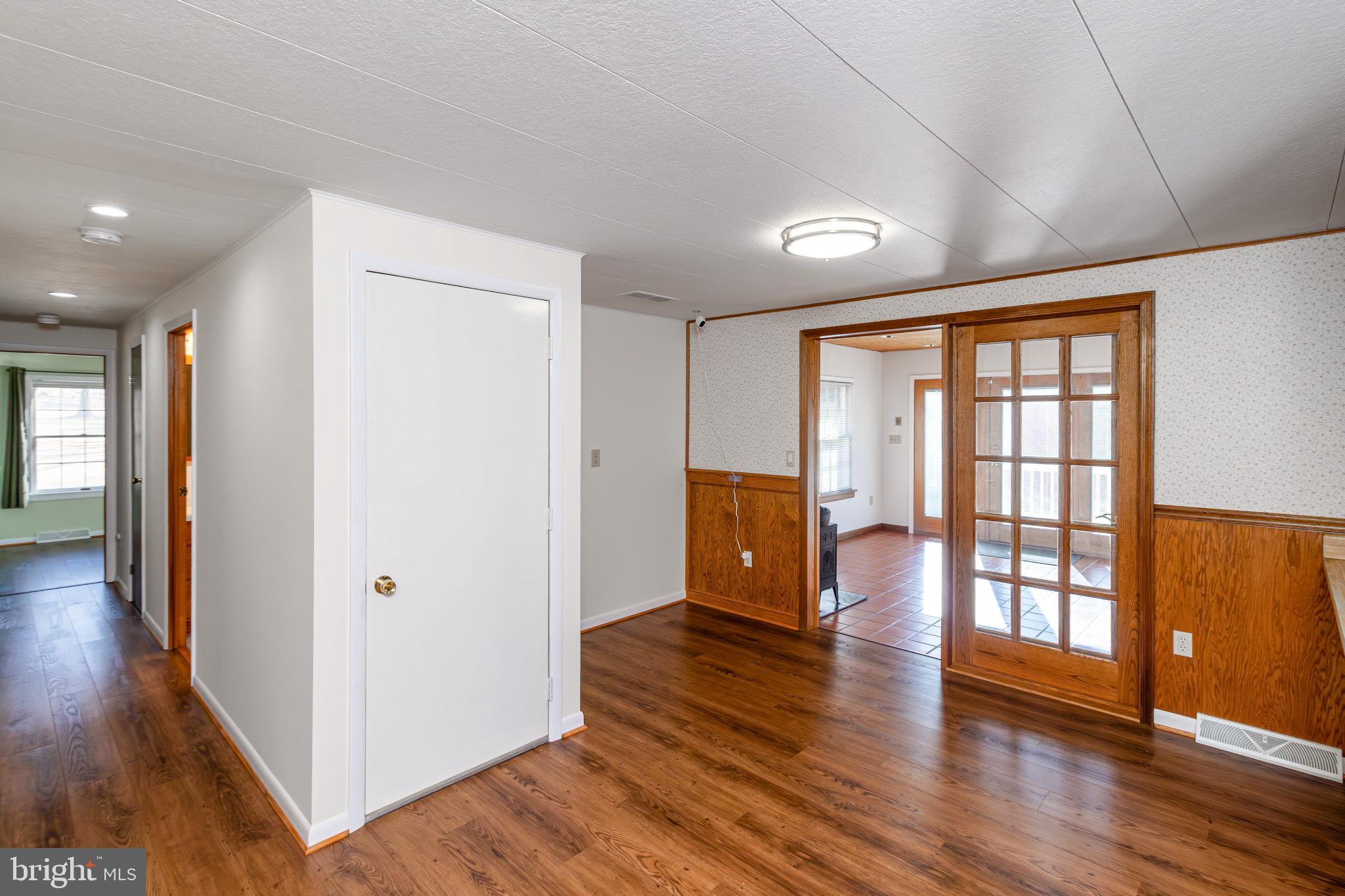 921 Palmer Road Fort Washington, MD 20744 - Photo 11 of 25 Spacious entryway with warm wood accents.