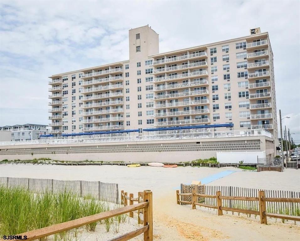 9400 Atlantic Avenue, Unit 306 Margate City, NJ 08402 - Photo 1 of 17 a view of swimming pool with outdoor seating