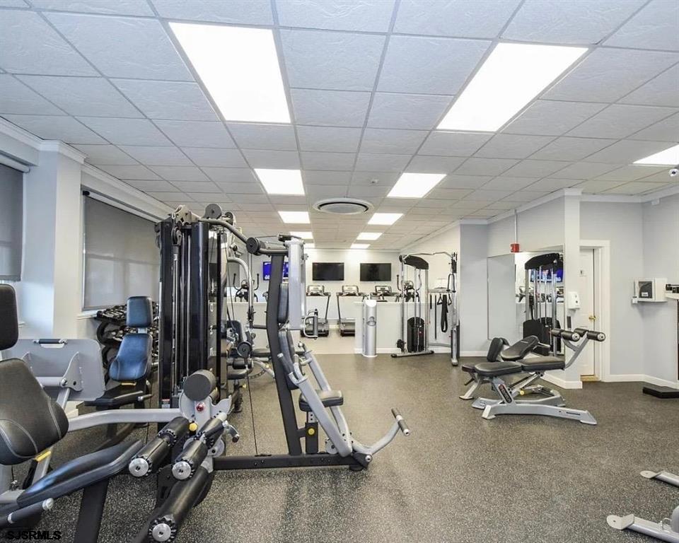 9400 Atlantic Avenue, Unit 306 Margate City, NJ 08402 - Photo 12 of 17 a view of a room with gym equipment