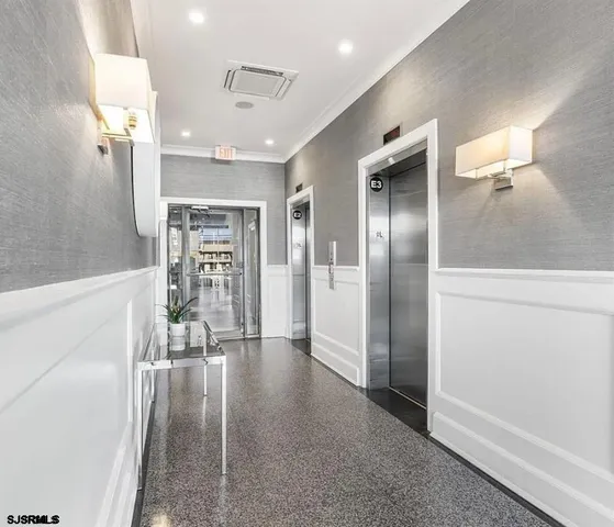 wooden floor in an empty room with a glass door
