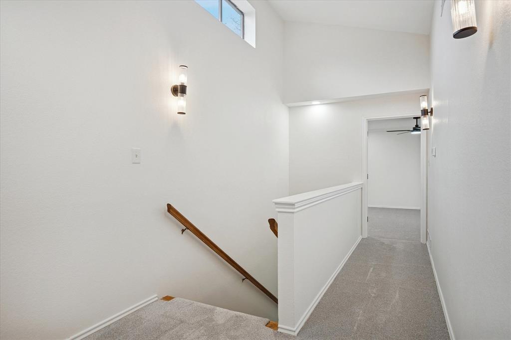 62 Legend Road Benbrook, TX 76132 - Photo 20 of 27 Stairs lead upstairs to the two secondary bedrooms with jack and Jill bathroom.