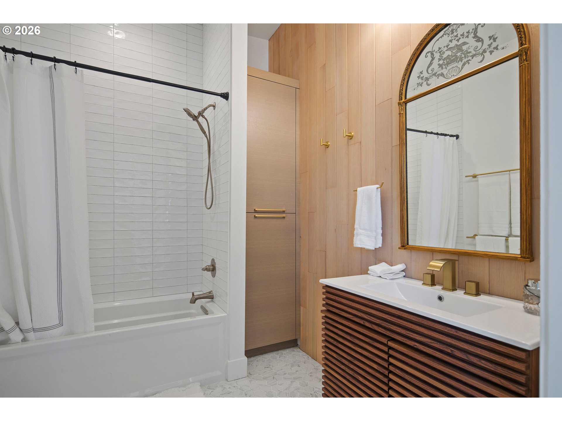 3403 Northeast Johns Loop Neotsu, OR 97364 - Photo 30 of 48 a bathroom with a sink a mirror and a shower