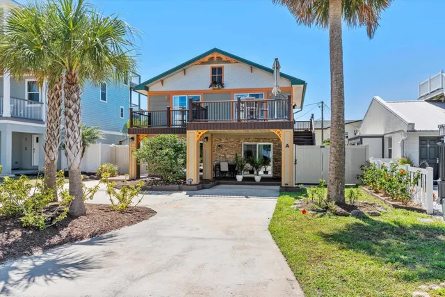 a view of a swimming pool with an outdoor seating and a yard