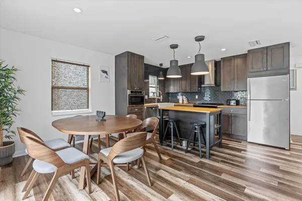 a bedroom with a bed and cabinets