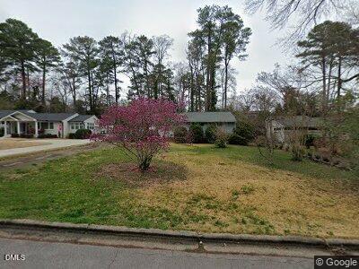 3418 Leonard Street Raleigh, NC 27607 - Photo 1 of 1 a view of a house with a yard