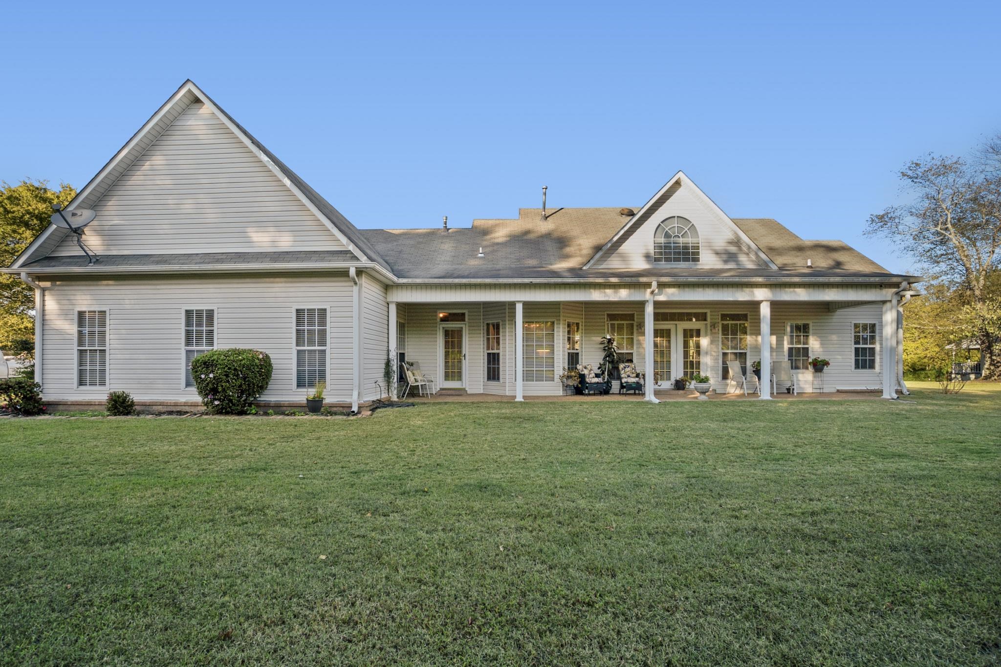 3779 Dancyville Road Stanton, TN 38069 - Photo 39 of 40 a front view of a house with a garden
