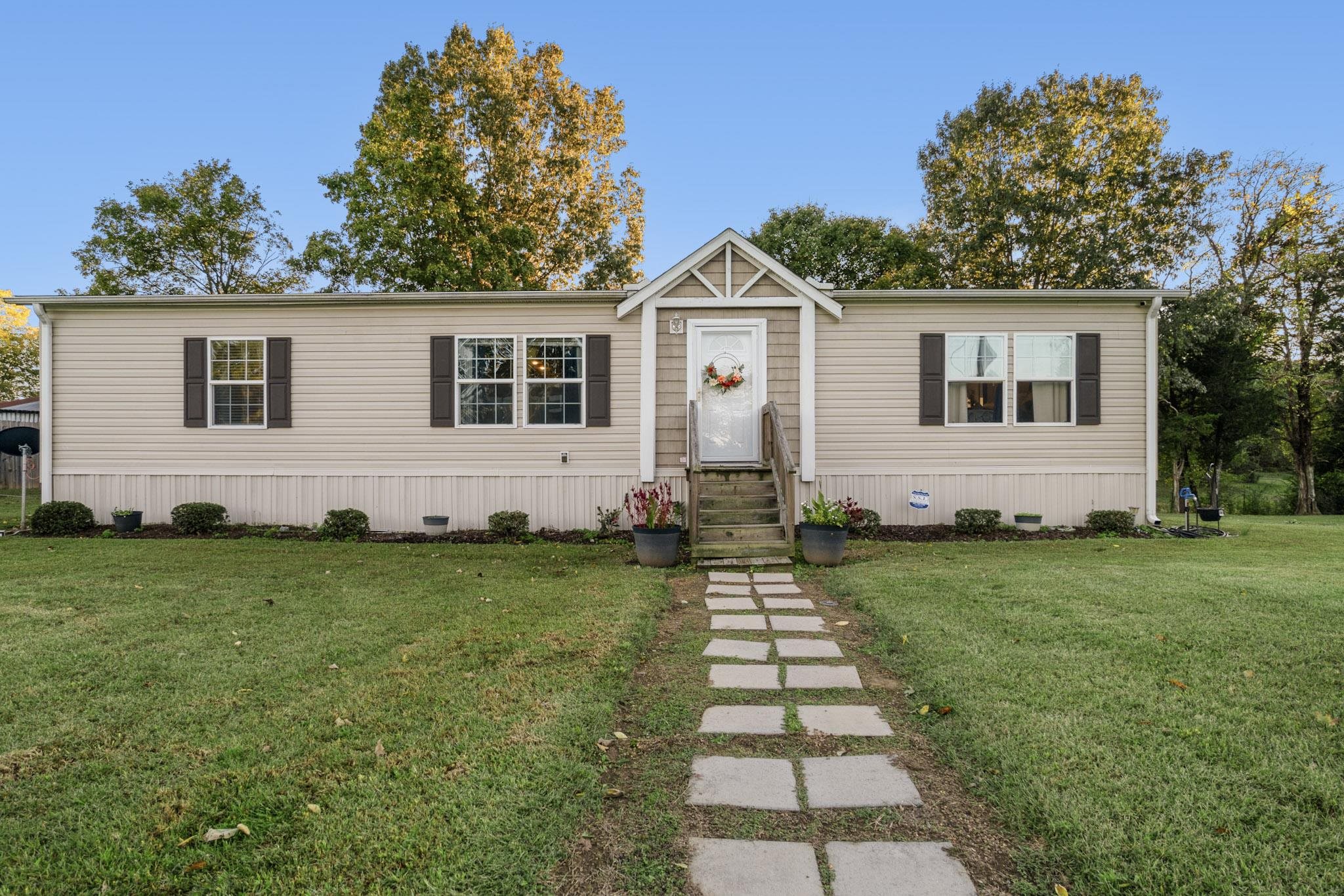 3779 Dancyville Road Stanton, TN 38069 - Photo 5 of 40 a front view of a house with a yard
