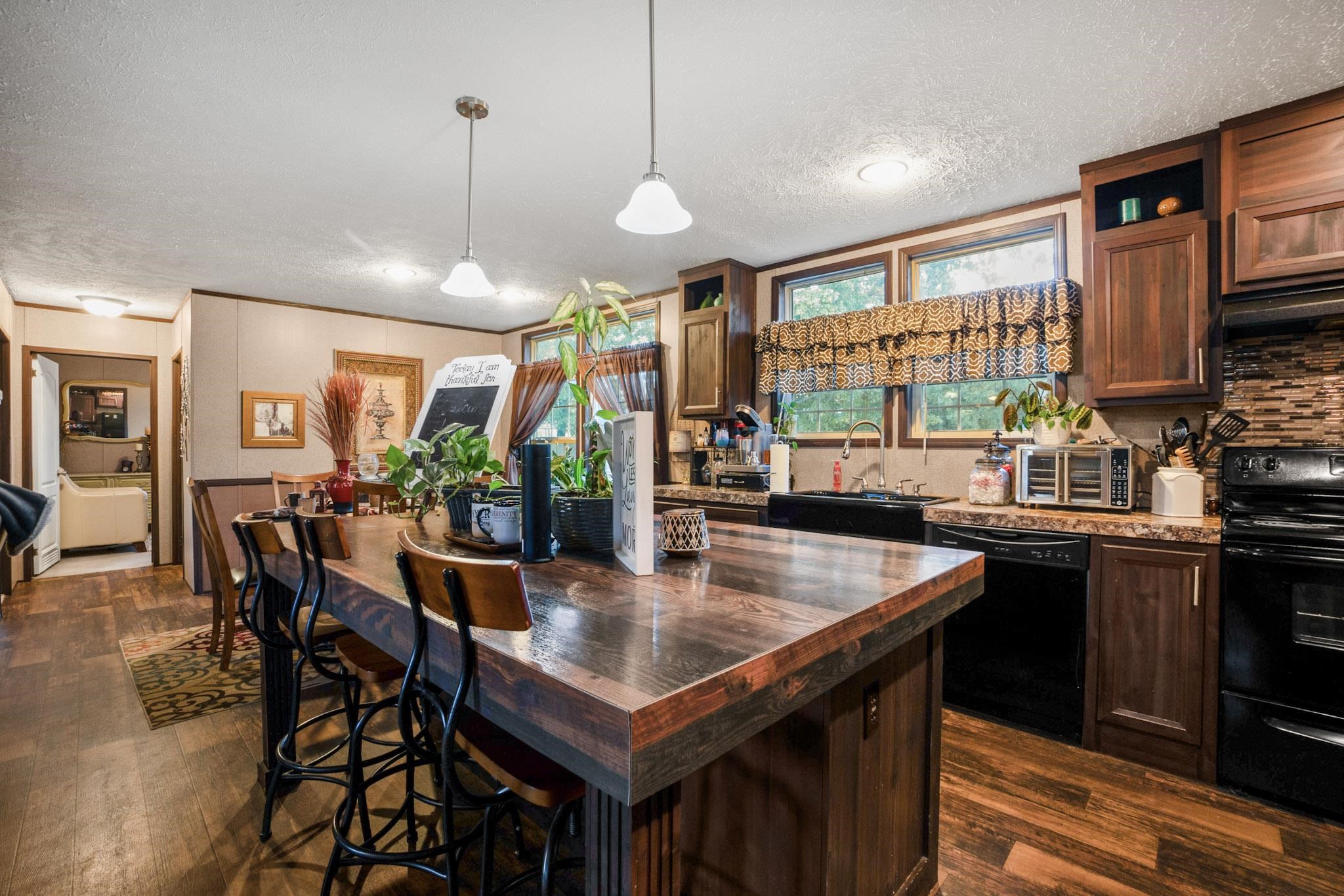 3779 Dancyville Road Stanton, TN 38069 - Photo 9 of 40 a dining table with chairs and window
