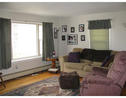 219 Highway 133 Winthrop, ME 04364 - Photo 9 of 25 Living Room. Spacious front window...
