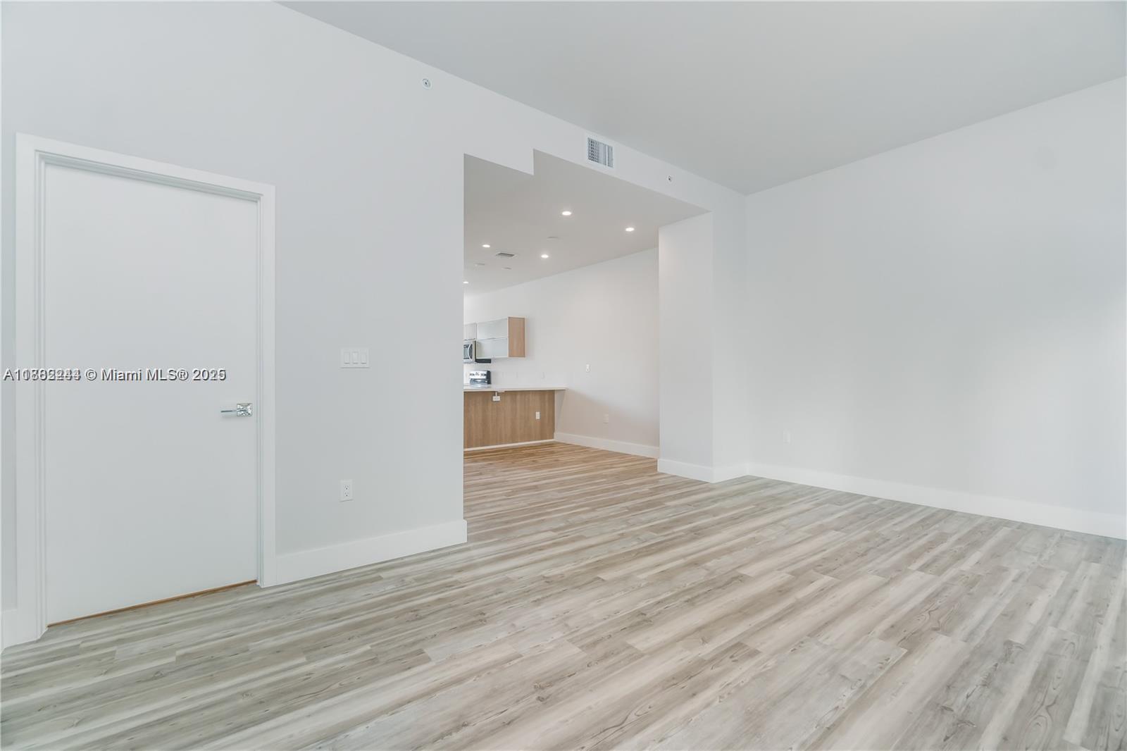 532 Southeast 1st Circle Pompano Beach, FL 33060 - Photo 18 of 57 a view of empty room with wooden floor