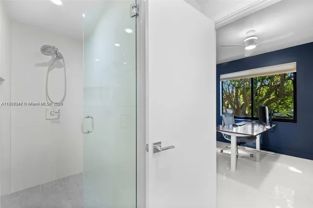 an empty room with wooden floor