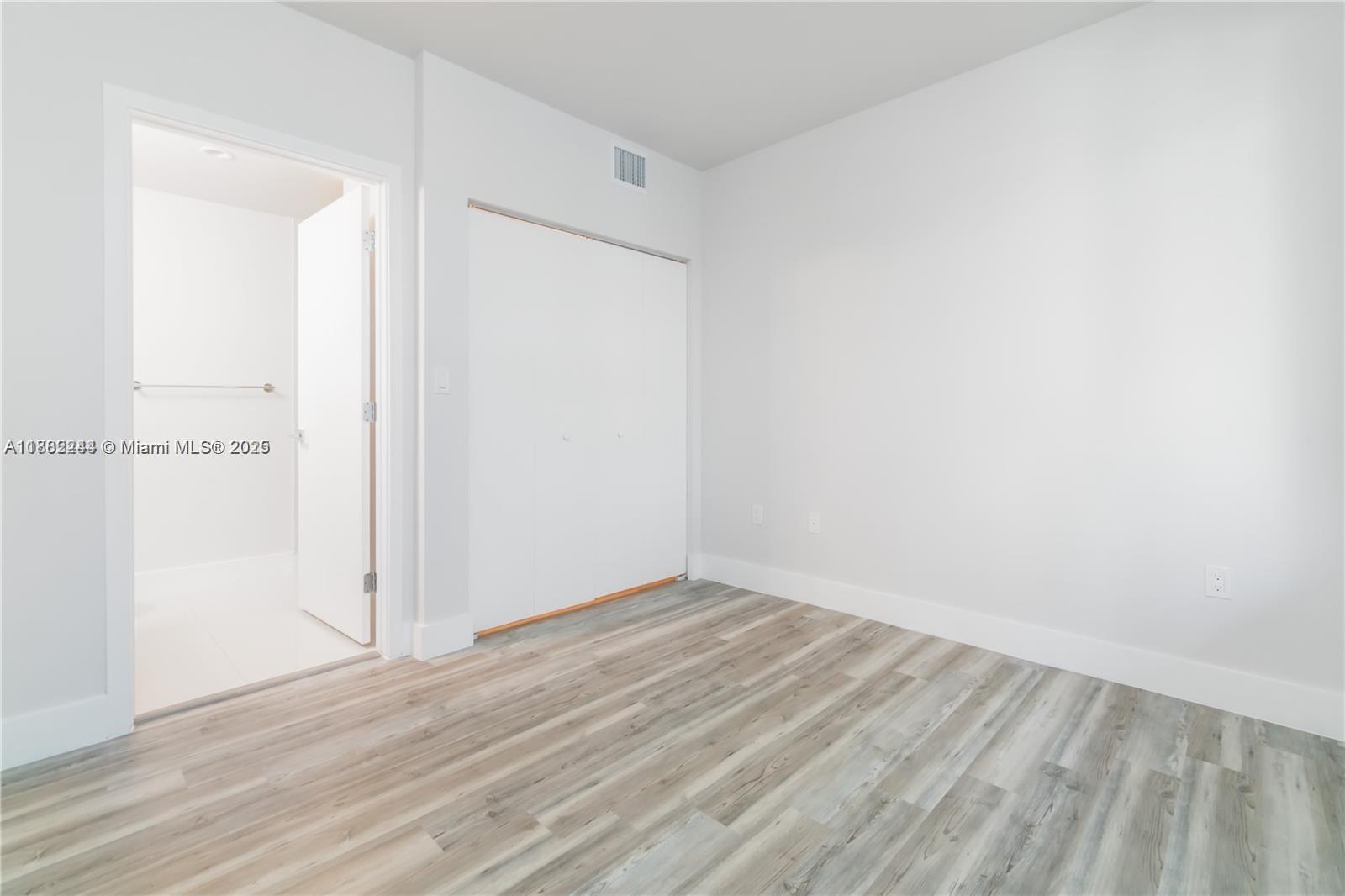 532 Southeast 1st Circle Pompano Beach, FL 33060 - Photo 29 of 57 an empty room with wooden floor